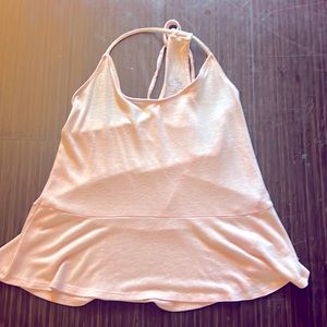 2 Hollister tank tops. Green is a small and the pink one is a medium.